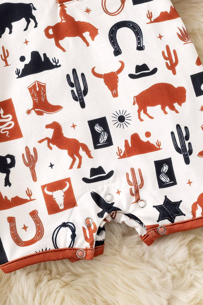Ivory multi-printed western baby romper with snaps. RPB60290 AMY
