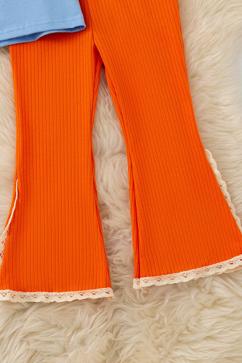 Fall Y'all" Blue ruffle top and orange pants with ivory lace hem. OFG61411 JEAN