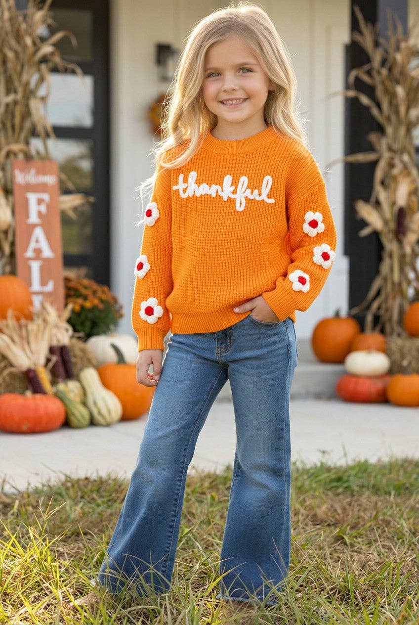 Orange Thankful knit sweater with embroidered flowers on sleeves. TPG60420 JEAN